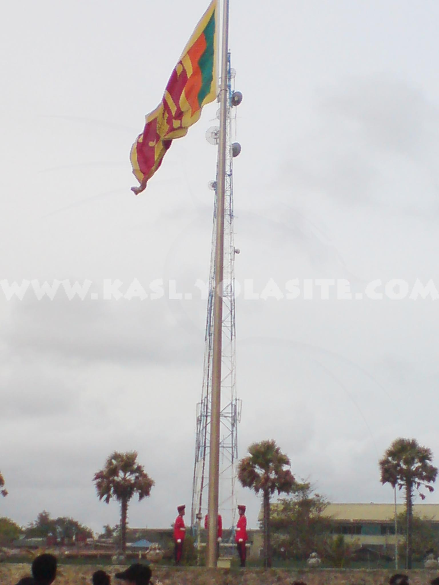 Sri lanka military police in galle face (Beach) repecting the national flag 